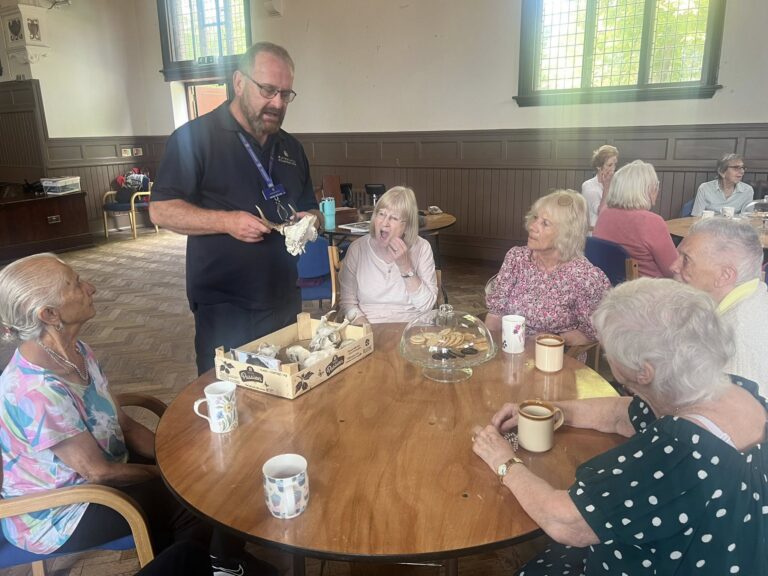 Friends sitting around a table at the Wednesday Club